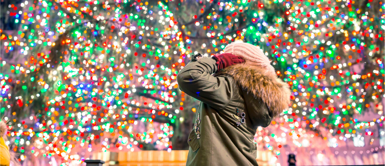 woman watching lights decorations