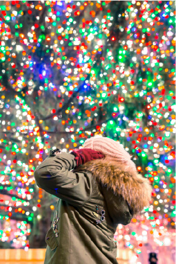 woman watching lights decorations